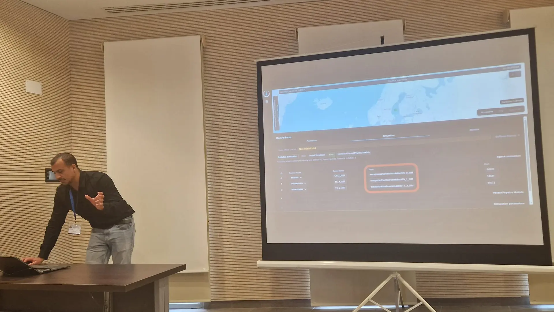 SceneGEMS simulation control panel projected during a talk